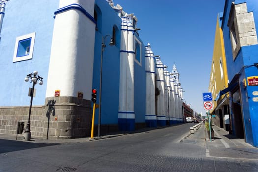 Blue church on the street in downtown Puebla, Mexico