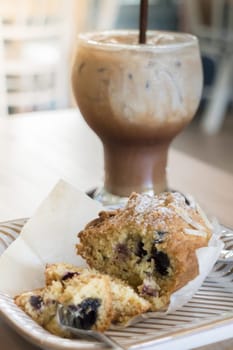 Blueberry muffin and iced coffee mocha, stock photo