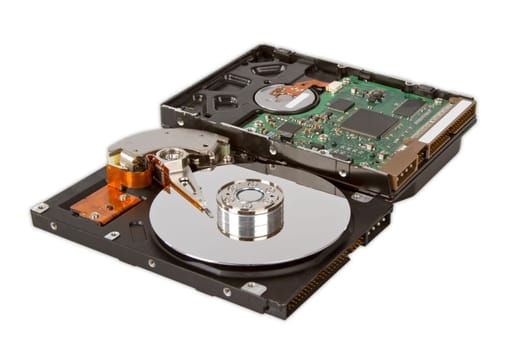 The inside of a hard disk drive on a light background