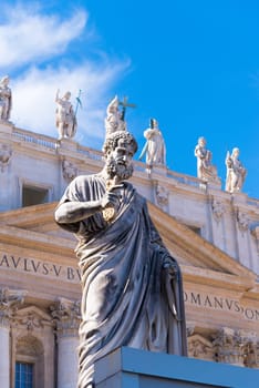 VATICAN CITY, VATICAN - OCTOBER 16, 2016: Statue Saint Peter in front of St Peter's Basilica on piazza San Pietro