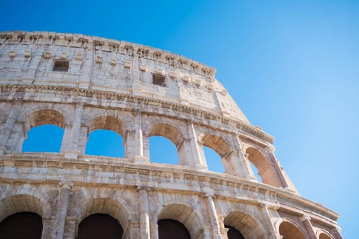 detail of the famous collosseum amphitheater in rome, italy
