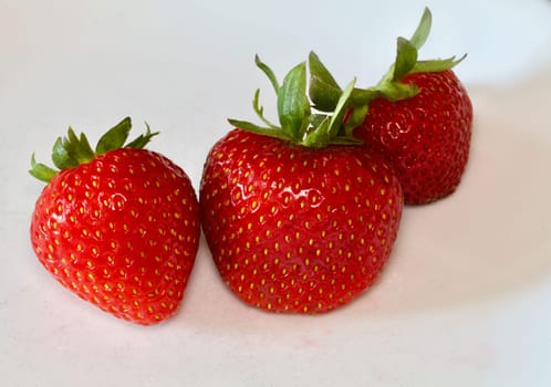 Three Strawberries