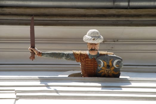 Graz Palais Saurau Goess Figure Turk Sword Dagger Goeß City Palace Warrior Turk Turks Turkish War QuintanaFigure Siege Shield Facade Styria Austria Turban Sporgasse