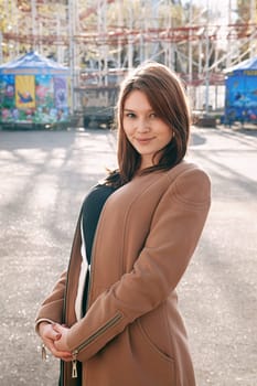 Urban girl standing out from the crowd at a city street.