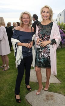 Katrin Aust and Gabriela Prinzessin zu Leiningen ,. Manfred Baumann invited to the yearly crab dinner in his house in Morsum - Sylt
