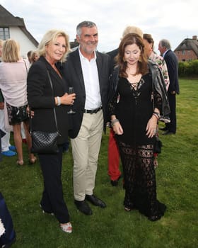 Sabine Christiansen with husband Norbert Medus and Vicky Leandros ,. Manfred Baumann invited to the yearly crab dinner in his house in Morsum - Sylt