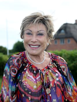 Antje Katrin Kuehnemann,. Manfred Baumann invited to the yearly crab dinner in his house in Morsum - Sylt