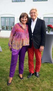 Manfred Baumann and Katharina Baumann invited to an honorary crab dinner in his house in Morsum - Sylt