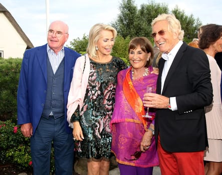 Wolfgang Seybold,Gabriela Prinzessin zu Leiningen ,Katharina Baumann ,Manfred Baumann.Manfred Baumann invited to the annual cancer dinner in his house in Morsum - Sylt