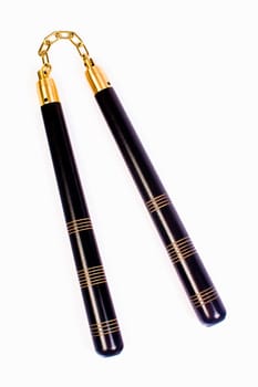 Nunchaku, the Asian weapon is isolated on white background.