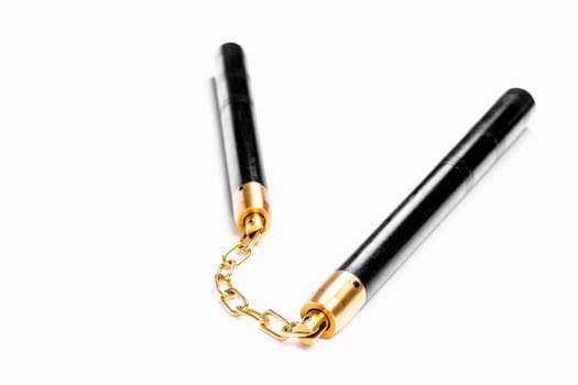 Nunchaku, the Asian weapon is isolated on white background.