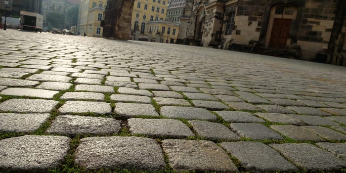 Cobblestones on the Neumarkt with Frauenkirche in Dresden in the backlight