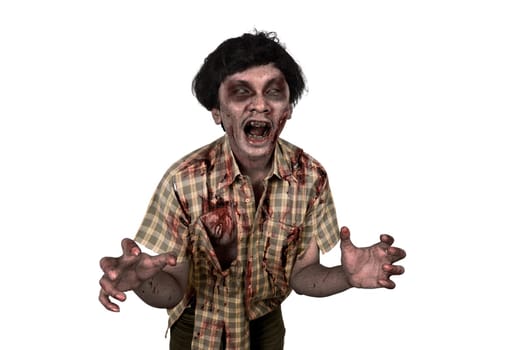Portrait of asian zombie man with claw hand standing isolated over white background