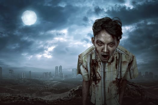 Creepy asian zombie man with angry face over dark sky background