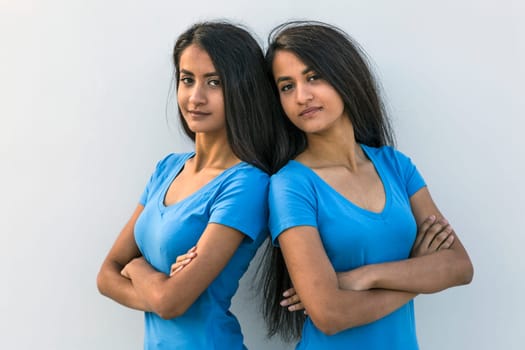 Handsome female twin couple - outdoor shot in summer
