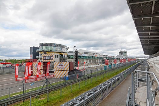 Nurburg, Germany - May 20, 2017: Fishermen's Friend Strongman RUN at race track Nurburgring - start on start finishing straight in front of Mercedes / AMG Lounge.