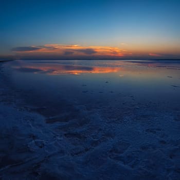 Beauty sunset on salty lake in Altay, Siberia, Russia