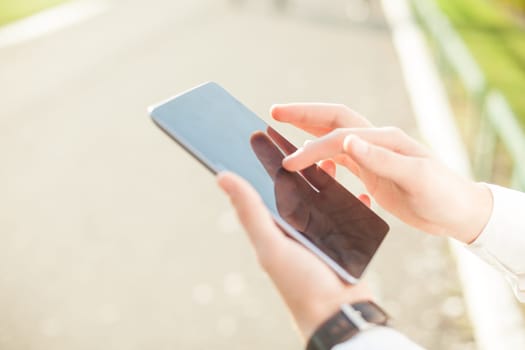 Close up of man hands using touchscreen on digital tablet