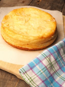 Tasty cheesecake in a kitchen, homemade food and bakery