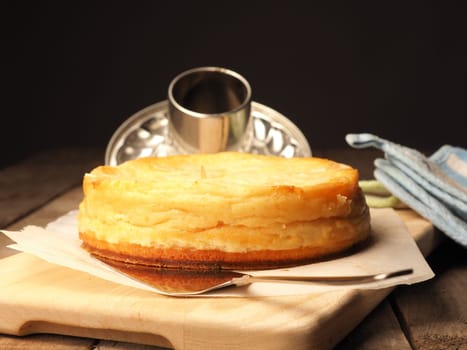 Tasty cheesecake in a kitchen, homemade food and bakery