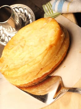 Tasty cheesecake in a kitchen, homemade food and bakery