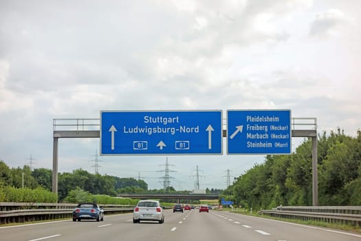 Pleidelsheim, Germany - June 28, 2017: Highway A81(Autobahn) near town Pleidelsheim, exit Freiberg / Marbach (Neckar) / Steinheim (Murr) - direction Stuttgart / Ludwigsburg