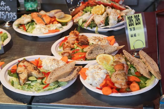 Various seafood on the shelves of the fish market in Norway, Bergen