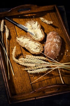 Whole wheat bread with butter,studio