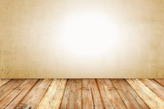 Copyspace background with an empty grunge wall with wooden floor below with large copy space for your text or advertisement