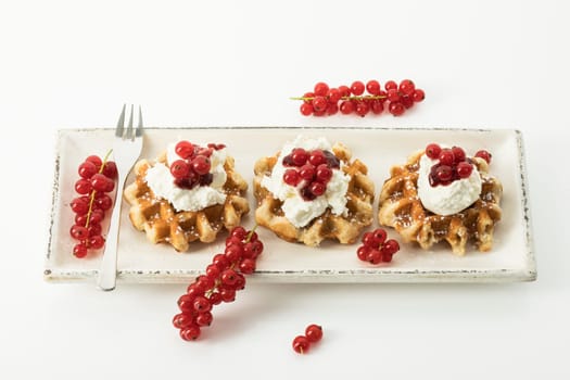 Waffles with currants and cottage cheese
