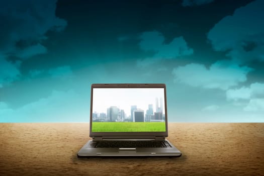 Large laptop on the desert. Internet connection concept