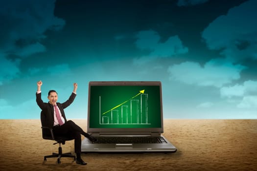 Business person looking giant laptop on the desert. Wireless concept