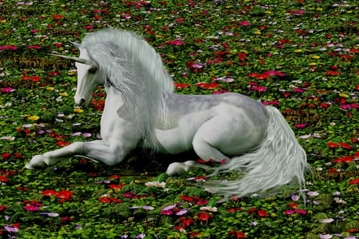 A beautiful white unicorn rests in a meadow full of wildflowers.