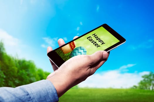 Man holding cellphone with happy easter application on the screen