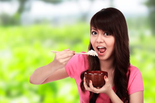 Asian pretty woman eating japanese food. Eat concept