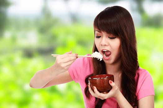 Asian pretty woman eating japanese food. Eat concept