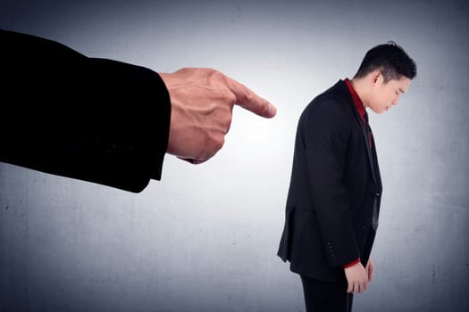 Concept of accused businessman with with fingers pointing. Human face expression emotion feeling