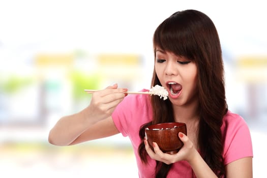 Asian pretty woman eating japanese food. Eat concept