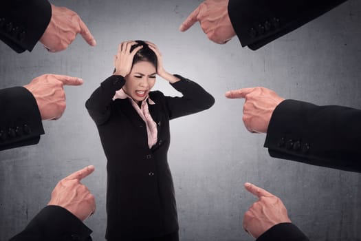 Concept of accused business woman with fingers pointing