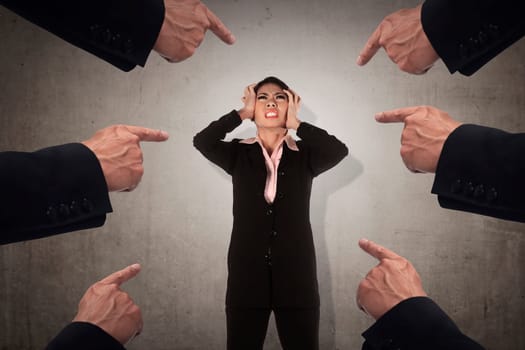 Concept of accused business woman with fingers pointing