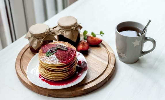 pancakes with plum jam delicious american breakfast