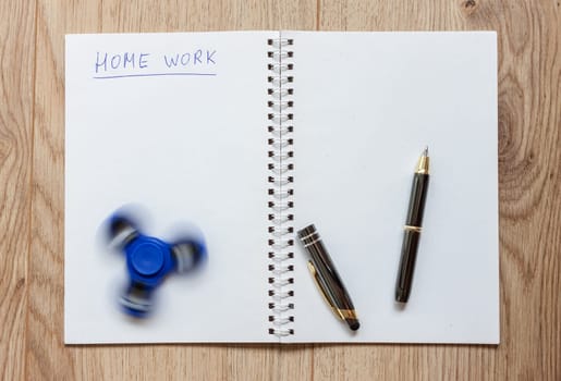 open notebook waiting for home work distracting spinner