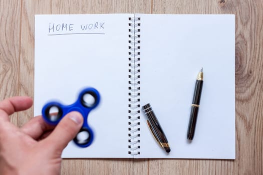 open notebook waiting for home work distracting spinner