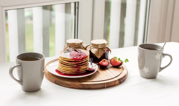 pancakes with plum jam delicious american breakfast