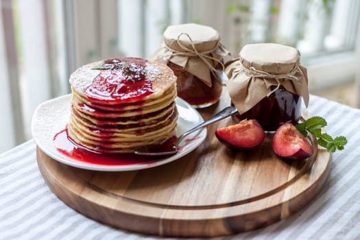 pancakes with plum jam delicious american breakfast