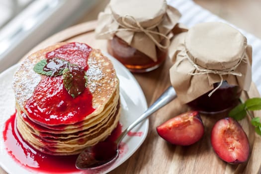 pancakes with plum jam delicious american breakfast