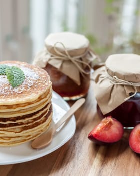 pancakes with plum jam delicious american breakfast