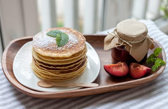 pancakes with plum jam delicious american breakfast