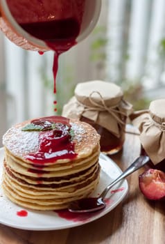 pancakes with plum jam delicious american breakfast