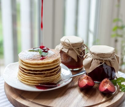pancakes with plum jam delicious american breakfast